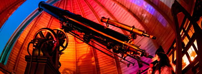 A student views a partial lunar eclipse at through the 12-inch telescope the University of Illinois Observatory.